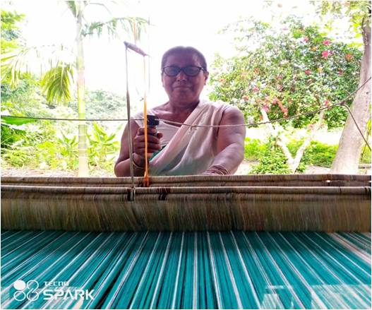 Smt. Leelabati Ray C/o. Lt. Katimal Ray Vill: Sakati Ujanpara P.O: Fulguri, Dist: Chirang, BTR Contact No. 7636908711 She  has set up her own handloom industry at home after availing Mudra loan of Rs. 50,000/- in the year 2019-20. She weaves Mekhela Chaddar (Assamese women dress) and is earning net profit of Rs. 9000.00 per month.